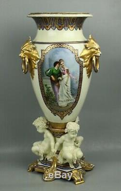 23 19C French hand painted porcelain Vase with Three Cherubs