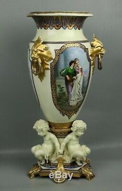 23 19C French hand painted porcelain Vase with Three Cherubs