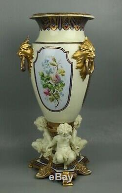 23 19C French hand painted porcelain Vase with Three Cherubs