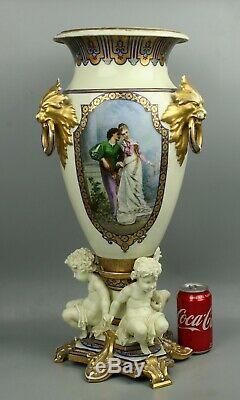 23 19C French hand painted porcelain Vase with Three Cherubs