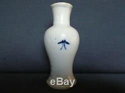 A Chinese porcelain pos. Kangxi u/g blue small Vase, 13.5cms. High, slight damage