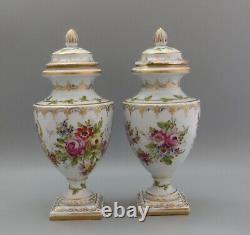 A Pair of Continental Porcelain Hand Painted Vases/Urns with Covers French