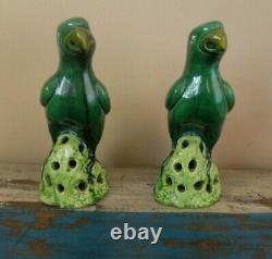 A pair of late 19th century Chinese green glaze ceramic porcelain parrots