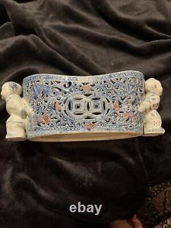 Antique Chinese Ovid Form, Reticulated pillow with bats & sages