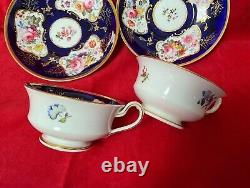 Antique Minton cobalt blue cup and saucer duo, hand painted flowers