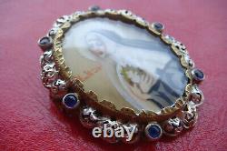 Antique Saint Rita of Cascia Hand painted Porcelain and blue stone sign brooch