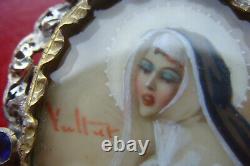 Antique Saint Rita of Cascia Hand painted Porcelain and blue stone sign brooch