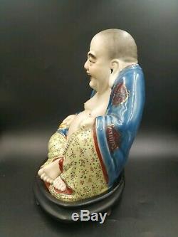 Antique chinese porcelain laughing buddha figurine