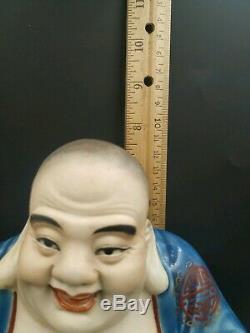 Antique chinese porcelain laughing buddha figurine