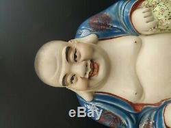 Antique chinese porcelain laughing buddha figurine