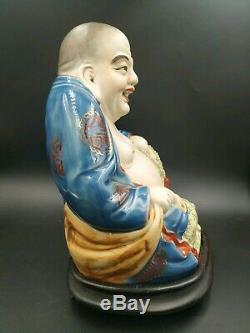 Antique chinese porcelain laughing buddha figurine