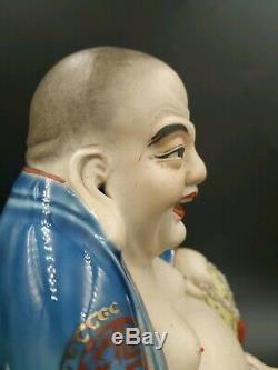 Antique chinese porcelain laughing buddha figurine