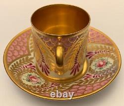 Antique porcelain Limoges coffee cup and saucer, decorated with hand painted flo