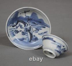 Blue Chrysanthemum Shipwreck Mountainous Riverscape Tea Bowl and Saucer c1660