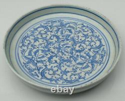 Chinese Transitional blue and white dish painted with flowerheads and leaves