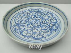 Chinese Transitional blue and white dish painted with flowerheads and leaves