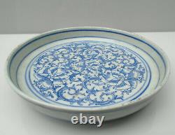 Chinese Transitional blue and white dish painted with flowerheads and leaves