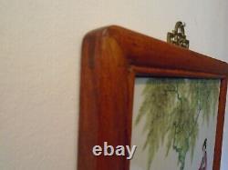 Chinese porcelain hand painted tile within wood frame and brass hanging bracket