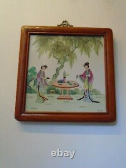 Chinese porcelain hand painted tile within wood frame and brass hanging bracket