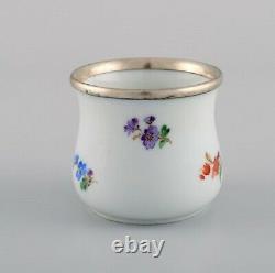 Five parts Meissen porcelain with hand-painted floral motifs and gold decoration