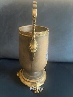 Highly Decorative Hand Painted Porcelain And Bronze Handled Urn c. 1880