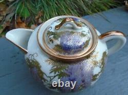 Japanese Fukagawa porcelain teapot hand painted in lovely colours lovely item