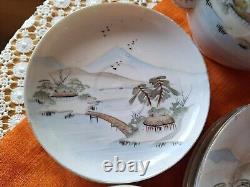 Japanese fine porcelain tea set 19 decorated with a landscape scene. Hand Painted