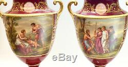 Pair Royal Vienna Austria Hand Painted Porcelain Double Handled Urns, circa 1900