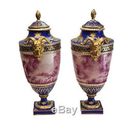 Pair Sevres France Porcelain Hand Painted Urns, c1900. Signed Perrot. Ram Heads