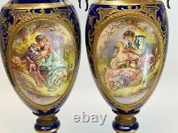 Pair Sevres Hand Painted Porcelain Double Handled Decorative Urns, circa 1900