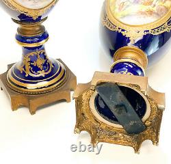 Pair Sevres Hand Painted Porcelain Double Handled Decorative Urns, circa 1900