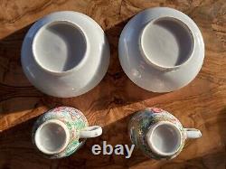 Pair of antique (19th Century) Chinese Export Rose Medallion cups and saucers