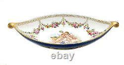 Sevres France Porcelain Hand Painted Sauce Boat, circa 1900. Cherubs