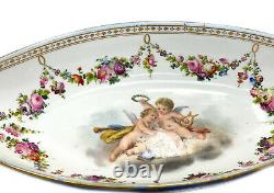 Sevres France Porcelain Hand Painted Sauce Boat, circa 1900. Cherubs