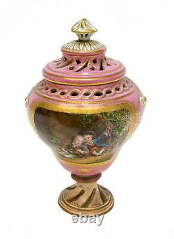 Sevres Hand Painted Porcelain Covered Urn, circa 1900. Courting scene