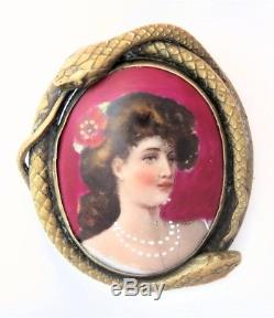 VICTORIAN HAND-PAINTED PORTRAIT ON PORCELAIN with GOLD OVER BRASS SNAKE FRAME PIN