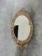 Vintage Gilt Oval Mirror Featuring Hand Painted Porcelain Miniatures