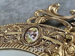 Vintage gilt oval Mirror Featuring Hand painted Porcelain Miniatures