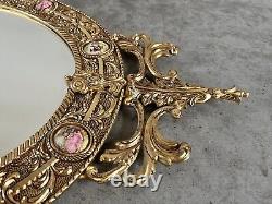 Vintage gilt oval Mirror Featuring Hand painted Porcelain Miniatures