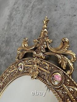 Vintage gilt oval Mirror Featuring Hand painted Porcelain Miniatures